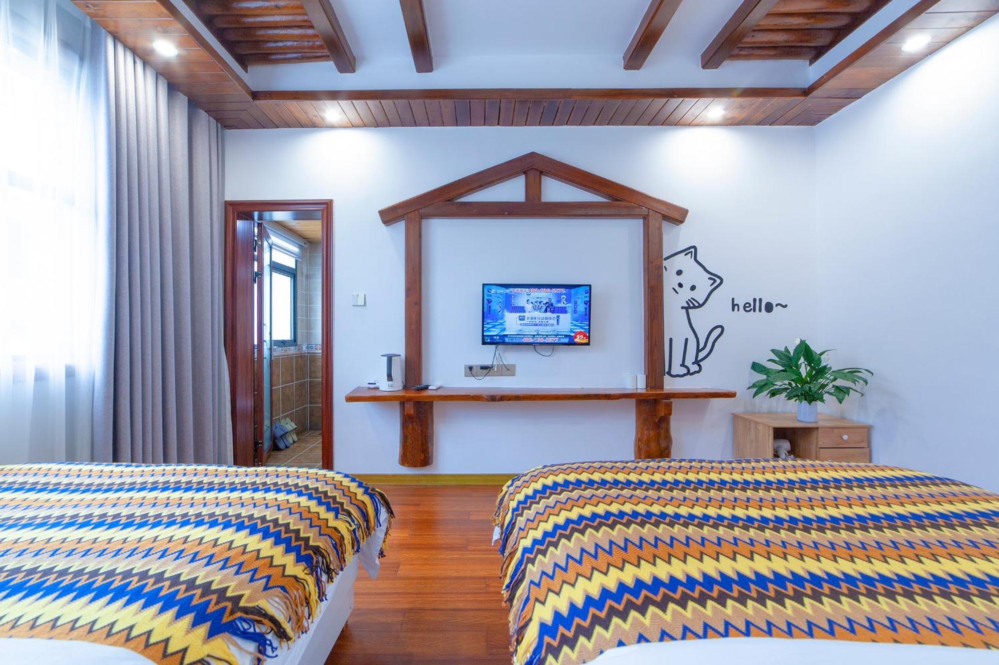 Отель Easy House Чжанцзяцзе Экстерьер фото